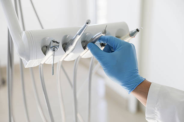 Professional Invisalign Clear Aligners technician working in Taos, NM